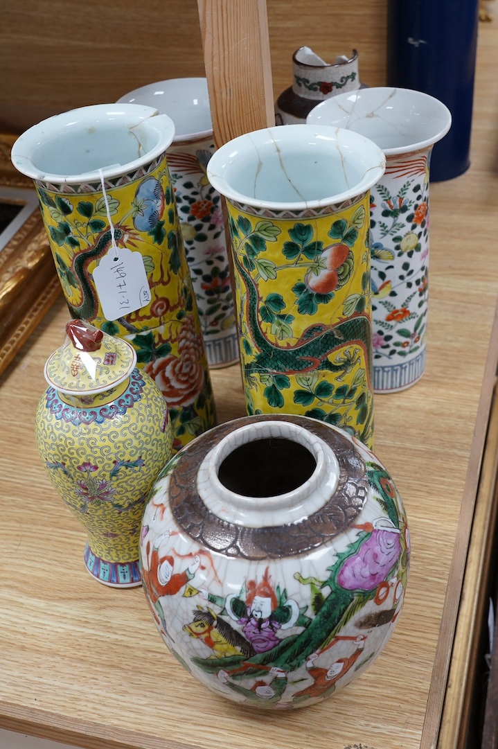 Two pairs of Chinese famille verte sleeve vases, a similar crackle glazed vase and jar, and a famille rose vase and cover, 19th century and later, tallest 29.5cm. Condition - poor